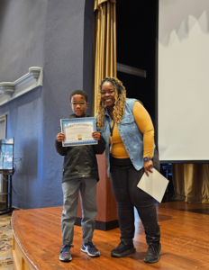 Mrs H and a studentwinner of a character award at St. Elizabeth's School 