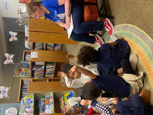 Kindergarten students prepare for story time in the library at St. Elizabeth's School in Denver